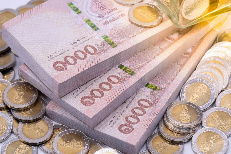 Thai baht notes and coins